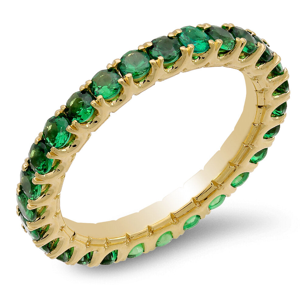 Emeralds in 18K gold form a beautiful band